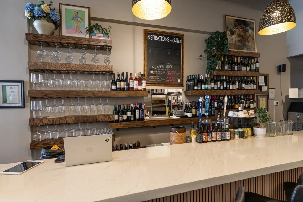 Bar at Vinicola Wine Bar featuring wines, craft beer, and seating in Front Royal, Virginia.